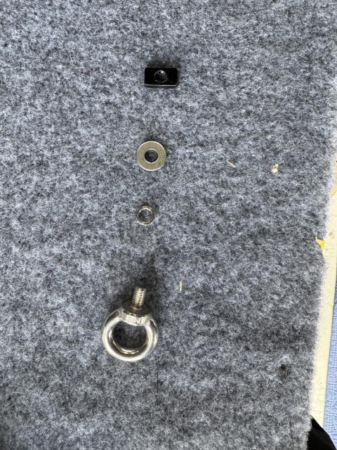 <p><strong>(Optional Step)</strong> Prepare the 6x Tie Down Eyelets for install.</p><p>You will need (Supplied in Tie down hardware bag):</p><p></p><ul><li><p>1x Tie Down Eyelet</p></li><li><p>1x Spring Washer</p></li><li><p>1x Flat washer</p></li><li><p>1x T-nut</p></li></ul><p></p>
