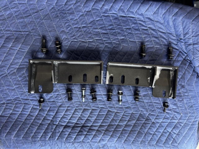 <p>Collect hardware required to fit the rear brackets.</p><p>You will need:</p><p></p><ul><li><p>6x M8x30mm Hex Head Bolts</p></li><li><p>6x M8 Flat washers</p></li><li><p>6x M8 Spring Washers</p></li><li><p>6x M8 Flange Nuts</p></li><li><p>4x M6x30mm Hex Head Bolts</p></li><li><p>4x M6 Flat washers</p></li><li><p>4x M6 Spring Washers</p></li><li><p>2x M6 Flange Nuts</p></li><li><p>L and R - Rear Brackets</p></li></ul><p></p>