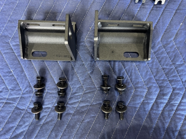 <p>Collect hardware required to fit the front brackets.</p><p>You will need:</p><p></p><ul><li><p>8x M8x30mm Hex Head Bolts</p></li><li><p>8x M8 Flat washers</p></li><li><p>8x M8 Spring Washers</p></li><li><p>4x M8 Flange Nuts</p></li><li><p>L and R Front Brackets</p></li></ul><p></p>