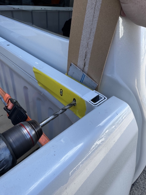 <p>Drill the holes out further with the 8.5mm bit.</p><p>Note: you will need a drill stop over your bit or something behind the tub to prevent damaging the cab.</p>