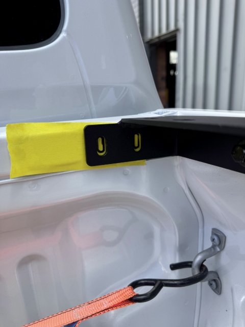 <p>Mark slotted holes across the front of the tub.</p>