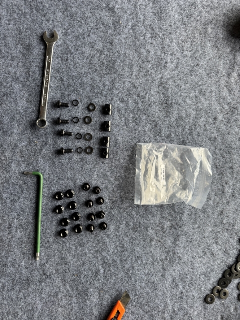 <p>Gather the tools required and prepare the fitting kit.</p><p><strong>Tools Required:</strong></p><p></p><ol><li><p>T30 Torx Key</p></li><li><p>13mm Spanner</p></li></ol><p><strong>Your fitting kit should contain the listed components:</strong></p><p></p><ul><li><p>Flat washer D8 (8 × 16 × 1.6 mm) — 4x</p></li><li><p>Spring washer D8 — 4x</p></li><li><p>Torx flat head bolt M8 × 16 — 8x</p></li><li><p>Hex flange nut M8 — 8x</p></li><li><p>M8 × 16 hex head bolt (full thread) — 4x</p></li><li><p>Spring clip nut M8 — 4x</p></li></ul><p></p>