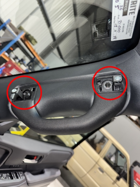 <p>Fit the two supplied brackets with the OEM grab handle bolts using the 10mm socket and driver - Ensure they are fitted on the correct sides by having the two mounting tabs facing away from eachother.</p>