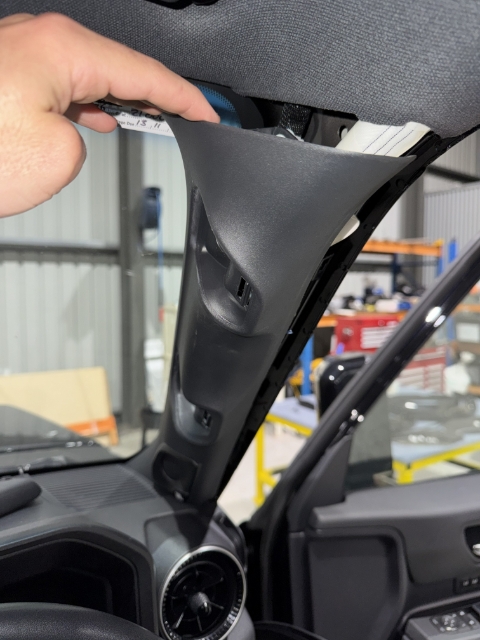 <p>To run wiring to the panel, we recommend removing the A-pillar panel for easy access. There is one panel clip at the very top of the panel which you can unclip and then lift the panel out.</p>