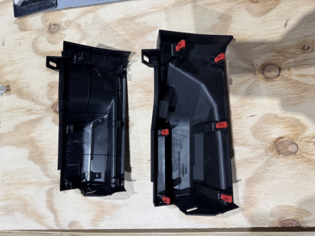 <p>Remove and refit the red clips from the OEM panel onto the OTA panel.</p><p>You may need to use a pick in order to remove these clips.</p>