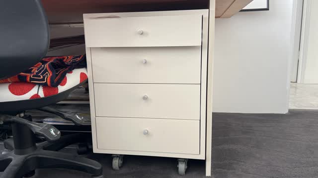 <p>Or behind the desk drawers</p>