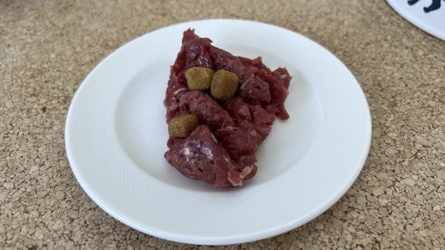 <p>Every morning give each cat half a sachet of meat and 10 or so munchies</p>
