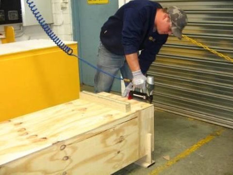 <p>Secure the bottom to the sides using the nail gun.</p>