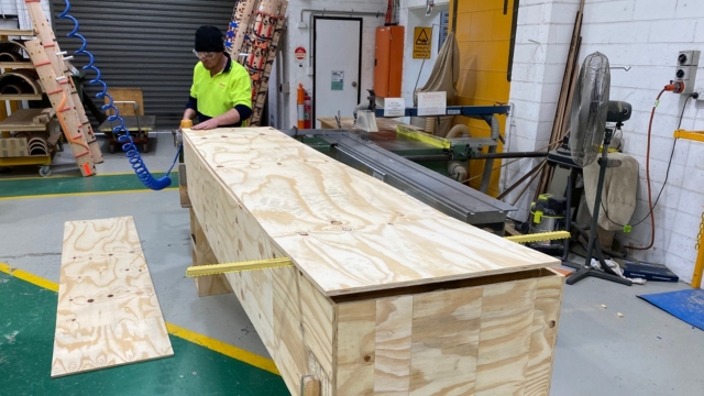 <p>Place base on the top of legs. Using a stick of timber to keep base from falling until nailed.</p><p>Nail one end, then the middle, before removing the stick and finish nailing base in place.</p><p></p>