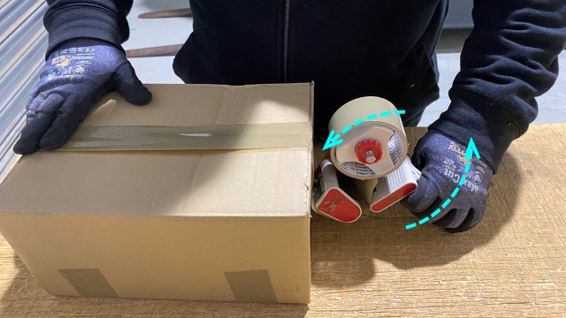 <p><strong>Cut the Tape:</strong></p><ul><li><p>When you've reached the end, push the clear tape against the tape to press it down agist the carton.</p></li><li><p>Tilt the rear of the tape gun upward and the serrated blade down to cut the tape.</p></li></ul><p></p>