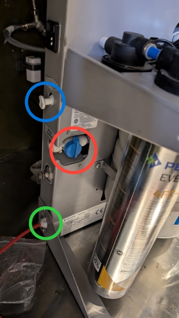 <ol><li><p>Ensure the outlet is closed for now. (RED)</p></li><li><p>Attach the drain hose and have it draining to a suitable location (GREEN)</p></li><li><p>Ensure the 'Tank' outlet has a plug placed in line (BLUE)</p></li></ol><p></p>