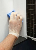 <h3>14. Sanitize surface areas of ice machine.</h3><p></p><p> Use a clean sanitizer-soaked cloth to sanitize ice machine surfaces, including the side walls, base (area above water trough), and the bin or dispenser. Spray surfaces with sanitizer solution and wipe down. </p><p>Manitowoc sanitizer is classified as a no rinse sanitizer - Do not rinse sanitized surfaces</p>