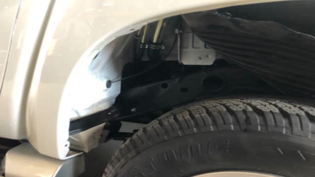 <p>Pull inner guard partially out of way</p>