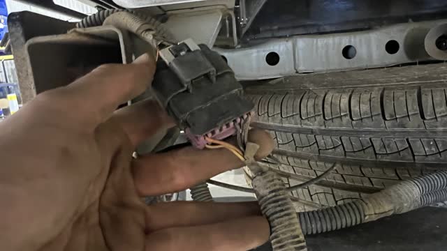 <p>Connect the reversing Centre harness stop. This is located on the passenger side rear</p>