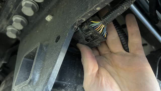 <p>Disconnect rear bumper plug, passenger side</p>