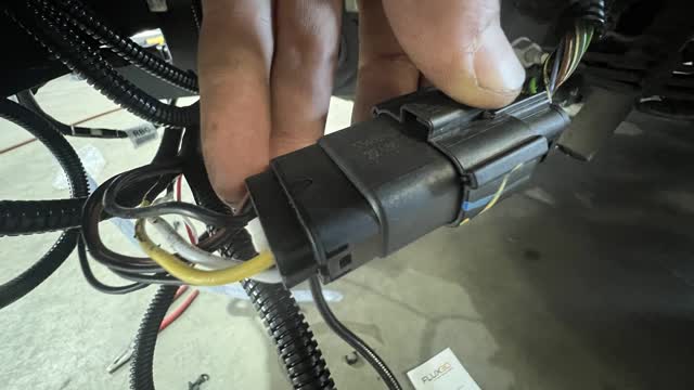 <p>Strip back the plastic sheath on both sides of the connection</p>