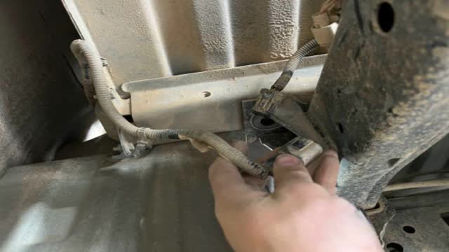 <p>Unplug behind passenger side wheel arch</p>