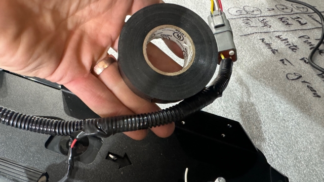 <p>Use electrical tape to tape up the wires neatly</p>