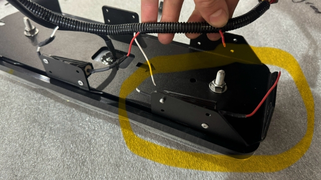<p>Trim the wires which are connected to this load resistor. It is the one closest to the plug on the LED tail light. This resistor is on the indicator circuit. We trimmed these wires as it is not required on the Ineos Grenadier</p>