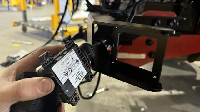 <p>Feed the wiring through the steel bracket</p>