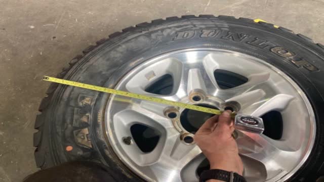 <p>Measure the centre distance of the tyre to be fit</p>
<p>In this example (LandCruiser GXL) it was approx 390mm</p>