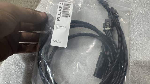 <p>Identify the pack of reversing sensor extensions. Part number is WH024.</p>