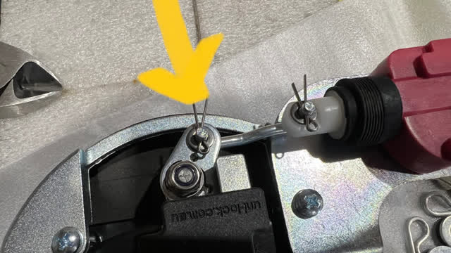 <p>Find this split pin on the latch</p>