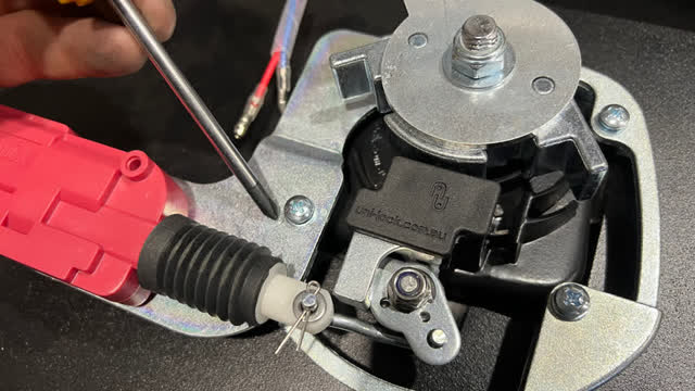 <p>Fit actuator, and thr 4 screws which secure the backing plate</p>