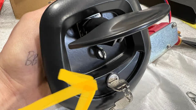 <p>Unlock the latch using the supplied keys</p>