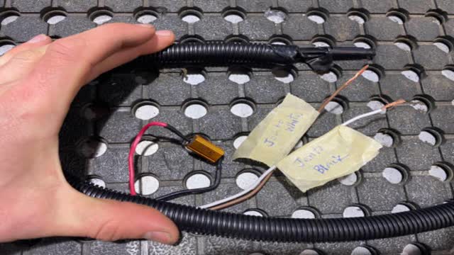 <p>Fit it with split conduit.</p>
<p>Mark the brown wire “join to white”</p>
<p>Mark the white wire “join your black”</p>