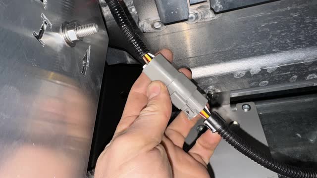 <p>Connect the tail light harness to the tail lights</p>
