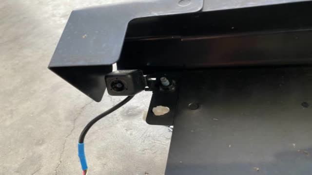 <p>Camera is to the left of where the lic plate would go</p>

