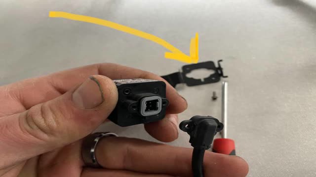 <p>Unplug and discard the original bracket</p>
