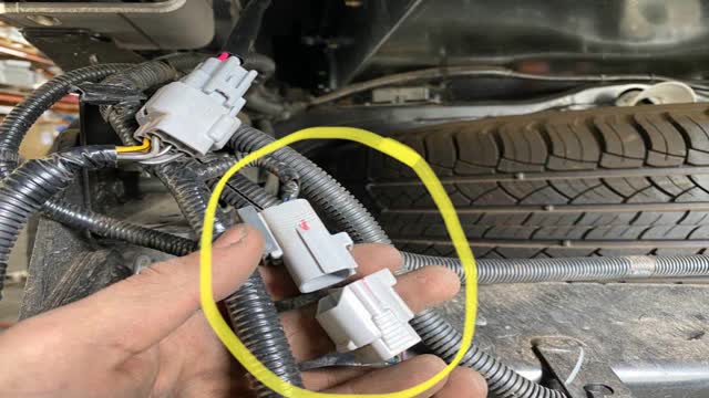 <p>Plug in harness, rear passenger side of vehicle</p>
