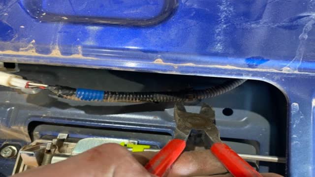 <p>Cut zip ties holding wiring</p>