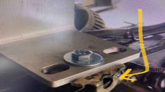 <p><strong>IF toolboxes are to be fitted.</strong></p>
<ul>
<li>Bend the "Tag" down on the middle mount. Looks like this when done.</li>
</ul>
