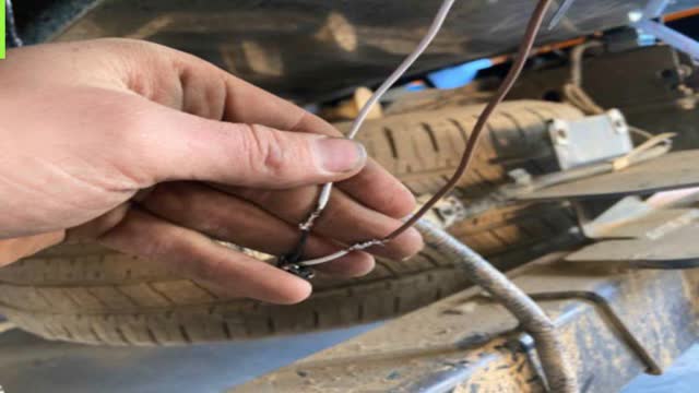 <p>Wire it to vehicle licence plate harness Brown = White White = Black</p>