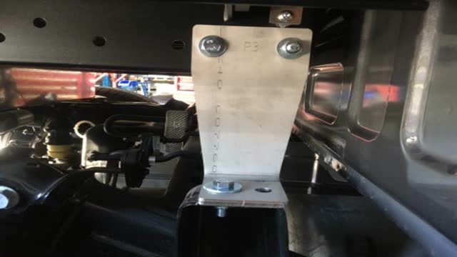 <p>"R3"</p>
<p>Front Mount, Drivers  side.
Note the chassis bolt is through the back hole in mount</p>
