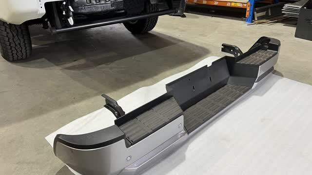 <p>The next step is removing the rear bumper.
Steps 14-17 are for <strong>NO FACTORY TOWBAR</strong>
Steps 18-20 are with <strong>WITH FACTORY TOWBAR</strong></p>