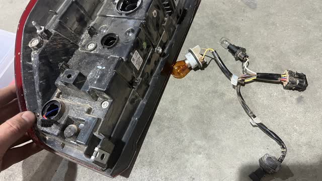 <p>Remove light harness from the (Tubs) tail light</p>
