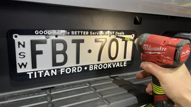 <p>Remove license plate (if one is fitted)
Phillips head screwdriver</p>