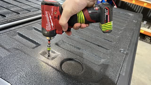 <p>T20 Torx Bit. Remove plastic tailgate cover.</p>