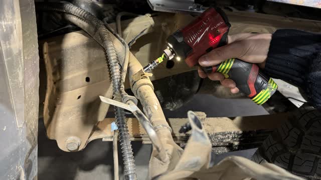 <p>Undo the hose clamp holding the fuel neck it is 7 mm</p>
