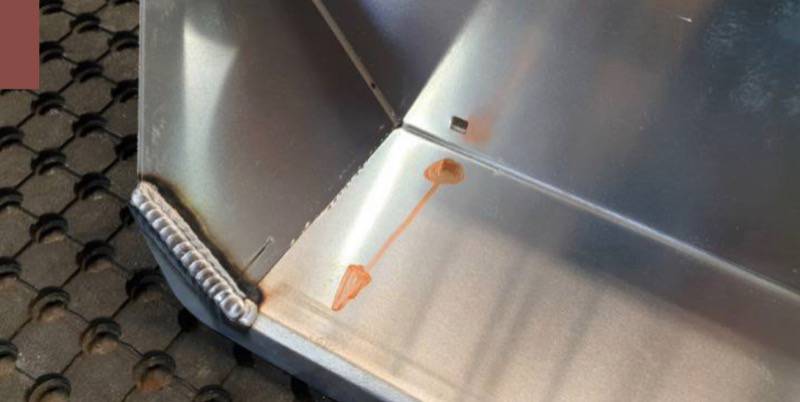 <p>Flip part over, and anticipate weld direction shown</p>
