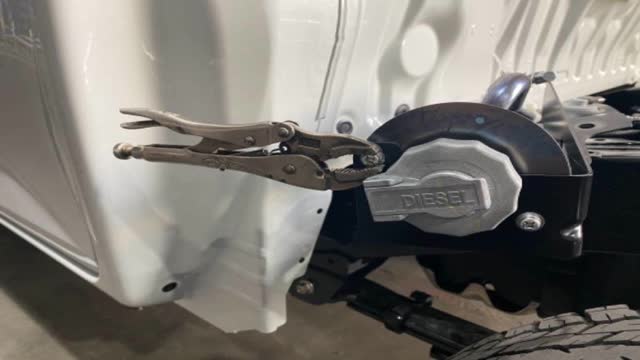 <p>Very Tight!
TRICK: Often, if you just try to use a Phillips head screwdriver to undo, the bolt head will strip (the bolts are too soft....) so, it is a good idea to first use a clamp to loosen the bolt, then you can use a Phillips head to remove.</p>