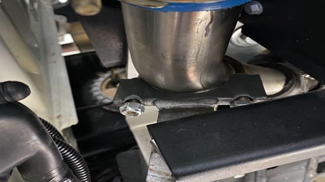 <p>A view from above of securing clamp</p>