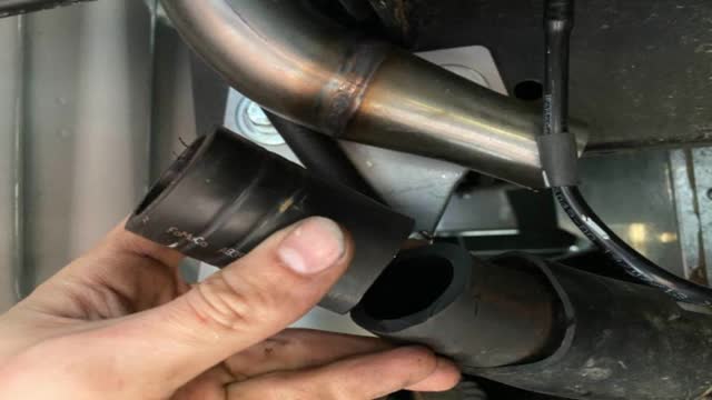 <p>Trim (approx 60mm) of original hose to suit stainless pipe</p>