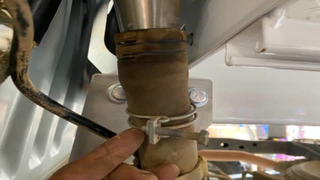 <p>On a BT50, it will have this original clamp. Discard this, as it is too small. Use supplied clamp as shown below.</p>