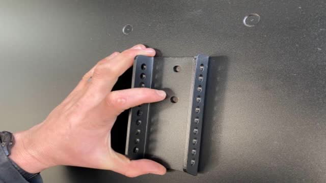 <p>Position the bracket, and mark the holes to be drilled</p>