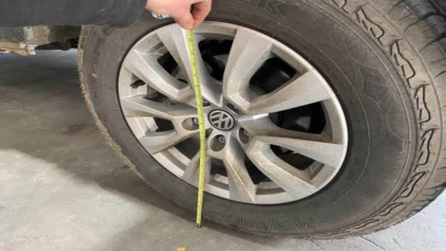 <p>Measure the tyre to be used.</p>
<p>Determine the radius (distance from outside to centre)</p>